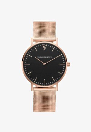 Schwarz-goldene Uhr mit einem roségoldenen Stahlmesh-Armband, minimalistisches Design, schlanke Zeiger und kleine Stundenmarkierungen. Markennamen deutlich sichtbar.