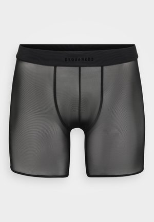 Mustat läpinäkyvät bokserit pehmeällä elastisella vyötärönauhalla, jossa on hienovarainen logo. Kankaan sileä tekstuuri korostaa suunnittelun yksinkertaisuutta.