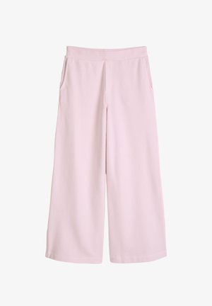 Lichtroze wijde broek met zijzakken, elastische tailleband en gladde stof, plat weergegeven op een witte achtergrond.