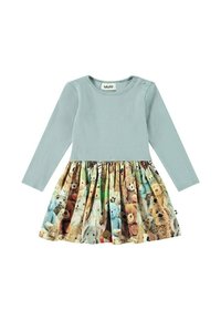 Ljusblå långärmad klänning med ribbat liv, som har en färgglad björntryckt plisserad kjol. Märken och knapppdetalj nära axeln.