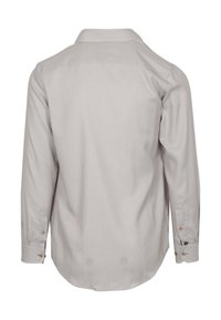 Lichtgrijs langetermijnshirt met een gestructureerde weving. Voorzien van een standaardkraag, knopenmanchetten en subtiele stiksels. Alleen achteraanzicht.