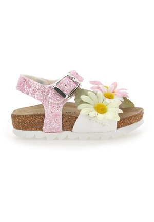 Kindersandale mit glitzerndem pinkfarbenem Knöchelriemen, weißem Vorderriemen, Korksohle und dekorativen Stoffgänseblümchen.