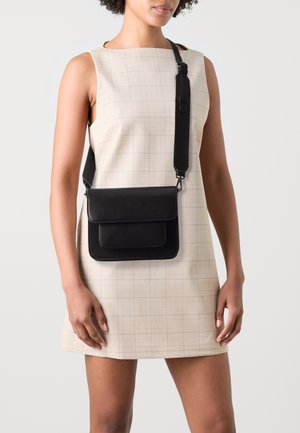 CAYMAN POCKET STRUCTURE - Cross body bag - black