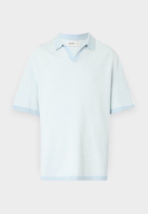 Light blue short-sleeve polo shirt with a textured pattern, V-neck, and contrasting light blue collar and cuffs.