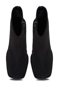 Black ankle boots made of soft suede with a smooth texture, featuring a zip closure on the side and a rounded toe design.