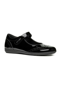 Black patent leather Mary Jane shoe with a rounded toe, decorative perforations, and a velcro strap for closure. Low rubber sole.