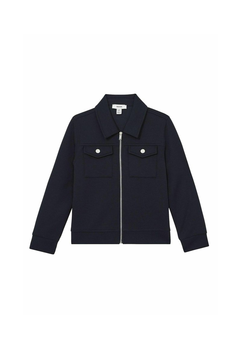 Námornícky zipsový kabát s veľkým golierom, dvoma náprsními vreckami so zacvakávacími uzávermi, ribovanými manžetami a hladkým povrchom.
