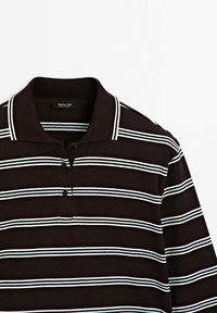 Brown polo shirt featuring horizontal stripes in light blue and white. Ribbed collar with three-button placket. Soft cotton material.