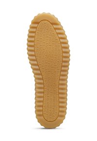 Suola in gomma con un motivo ondulato, con testo in rilievo che ripete "BLANCHE VOILE". Colore beige chiaro. Superficie texture che offre trazione.