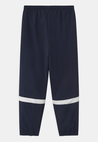 Nike Performance UNISEX - Teplákové kalhoty - obsidian/white