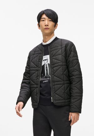PACKABLE - Übergangsjacke - black
