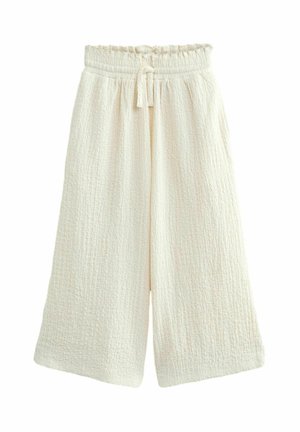Wijde crèmekleurige broek met gestructureerde stof, elastische tailleband en voorzijde met strikkoord.