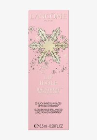 Lancôme Lip Idôle JuicyTreat, różowe opakowanie, złoty wzór płatka śniegu, szczegóły produktu w czarnym tekście, 8,5 ml, błyszczyk 3D zapewniający nawilżenie.