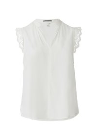 Blouse sans manches blanche avec un décolleté en V et des finitions en dentelle sur les épaules, présentant une texture douce et lisse ainsi qu'une coupe décontractée.