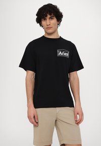 Aries UNISEX czarny