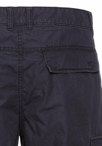 Dark blue cargo shorts featuring a textured fabric, back pocket with flap, reinforced stitching, and belt loops at the waistband.