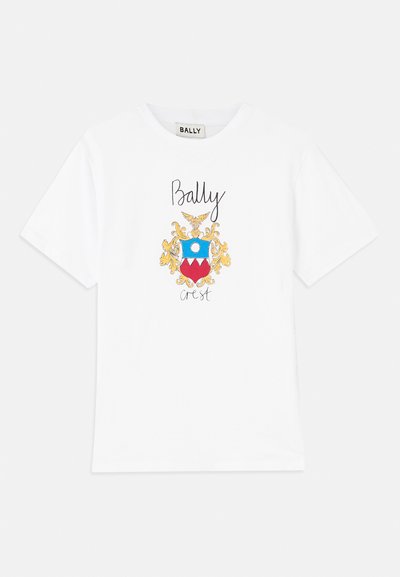 White cotton t-shirt featuring a colorful graphic crest with yellow accents, blue circle, and red triangles. "Bally" is printed in black above the crest.