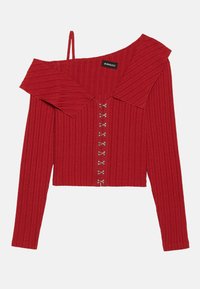 Red ribbed off-shoulder top with a collar, long sleeves, and decorative button closures down the front, made from a soft fabric.
