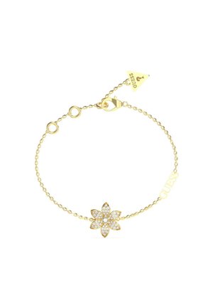 Gouden armband met een bloemenbedeltje versierd met talrijke heldere kristallen, verbonden door een delicaat schakeltje met een kreeftsluiter en merklabel.