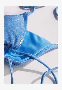 Sélectionné, lurex blue light
