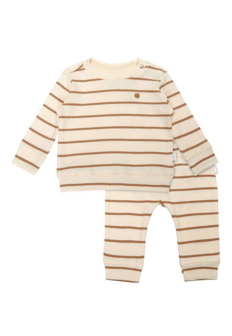 Ensemble pour bébé en coton comprenant un haut à manches longues crème et un pantalon assorti, tous deux ornés de rayures horizontales marron. Comprend un détail de bouton sur l'épaule.
