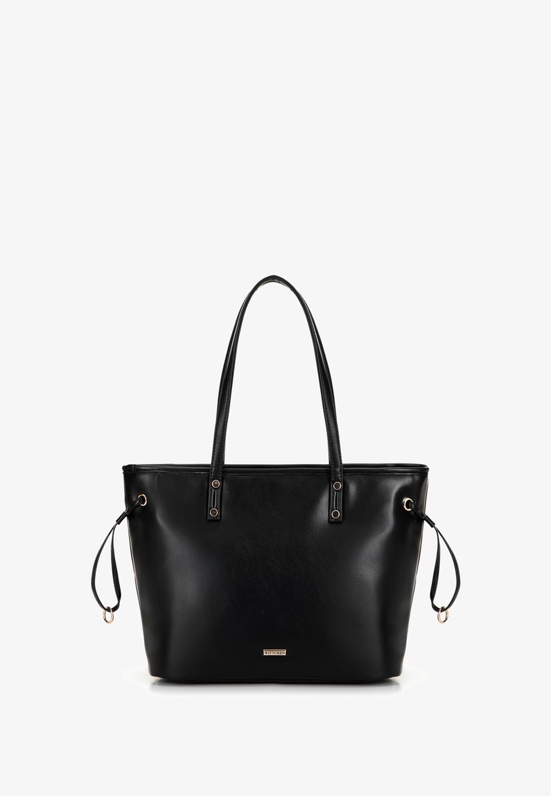 Bolso tote de cuero negro con dos asas superiores, detalles en dorado y cierre de cordón en los lados. Textura suave, diseño minimalista.