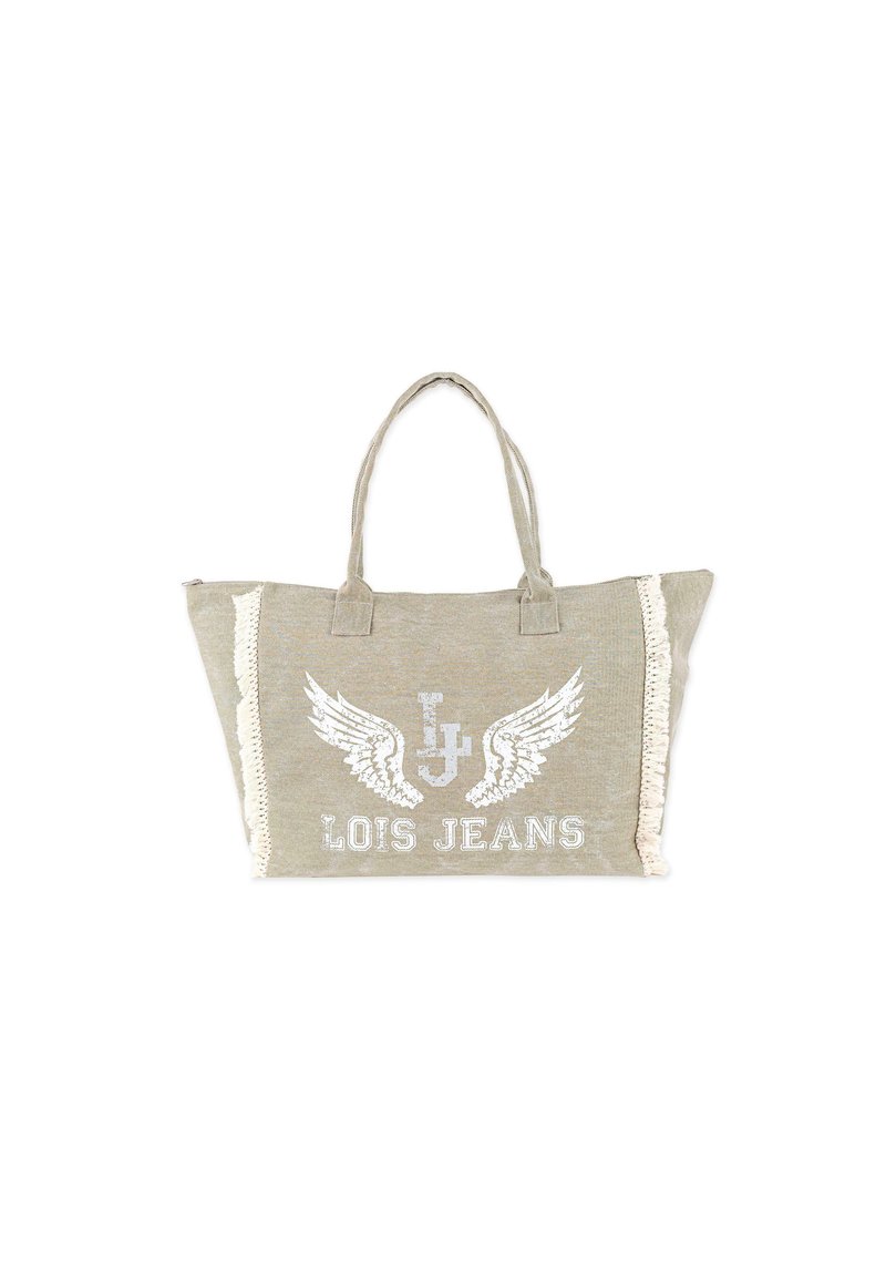 Bolsa tote beige con asas dobles, que presenta un logo impreso con alas, acentos de flecos en un lado y un acabado de tela texturizada.