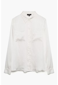 White long-sleeve blouse made of smooth fabric with a pointed collar, front buttons, and two chest pockets. Cuffs are buttoned.