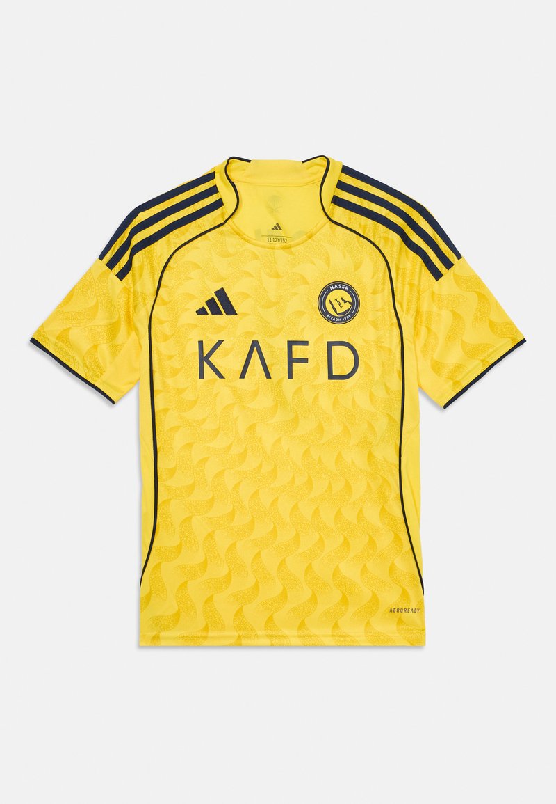 Geel sportshirt met golvend patroon, zwarte accenten en logo op de voorkant. Heeft korte mouwen en een ronde hals. Gemaakt van lichtgewicht materiaal.