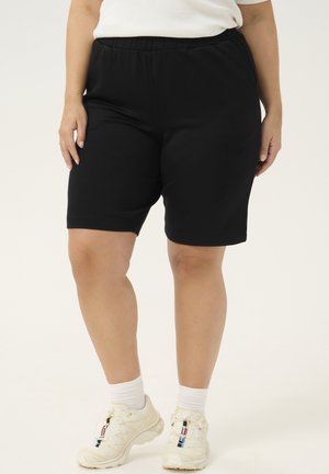 KCANNITA - Tracksuit bottoms - black deep