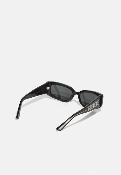Black rectangular sunglasses with gray lenses. Thick plastic frames with a glossy finish. Accompanied by silver logo accents on temples.