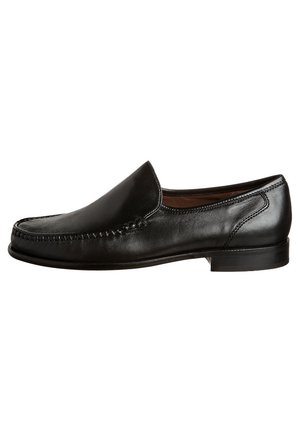 Black leather slip-on shoe with a rounded toe, stitched detailing on the front, and a low heel. Smooth texture with minimal accents.