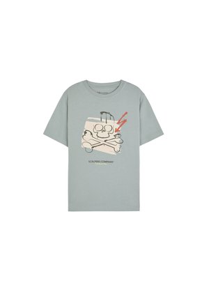 Camiseta de algodón de color azul claro con un corte relajado, que presenta un gráfico de una calavera y huesos cruzados con un rayo en el centro.