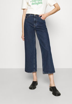 KIRI - Flared Jeans - stone blue