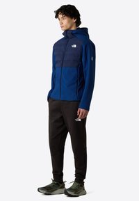 The North Face M MOUNTAIN ATHLETICS CARI HOODED JACKET - Winterjas - estate blue summit navy