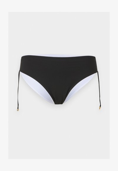 Μαύρο κάτω μέρος μπικίνι με λευκή εσωτερική επένδυση και ρυθμιζόμενους πλαϊνούς δεσμούς με μεταλλικές άκρες σε χρυσό χρώμα σε ανοιχτό φόντο.
