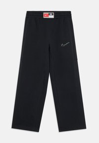 Svarta Nike-byxor med elastisk midja, med en flerfärgad broderad logotyp. Rakt bensnitt med sidofickor. Mjuk tygstruktur.