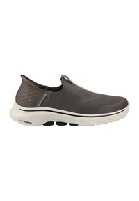 Slip-on athletic shoe in dark gray mesh with textured heel and light gray rubber sole. Features subtle accents and flexible design for comfort.