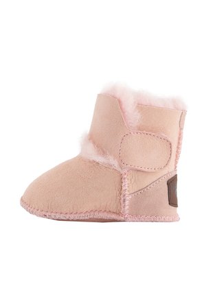 Light pink suede boot with a soft, fluffy lining. Features stitched accents and a hook-and-loop fastener on the side for easy access.