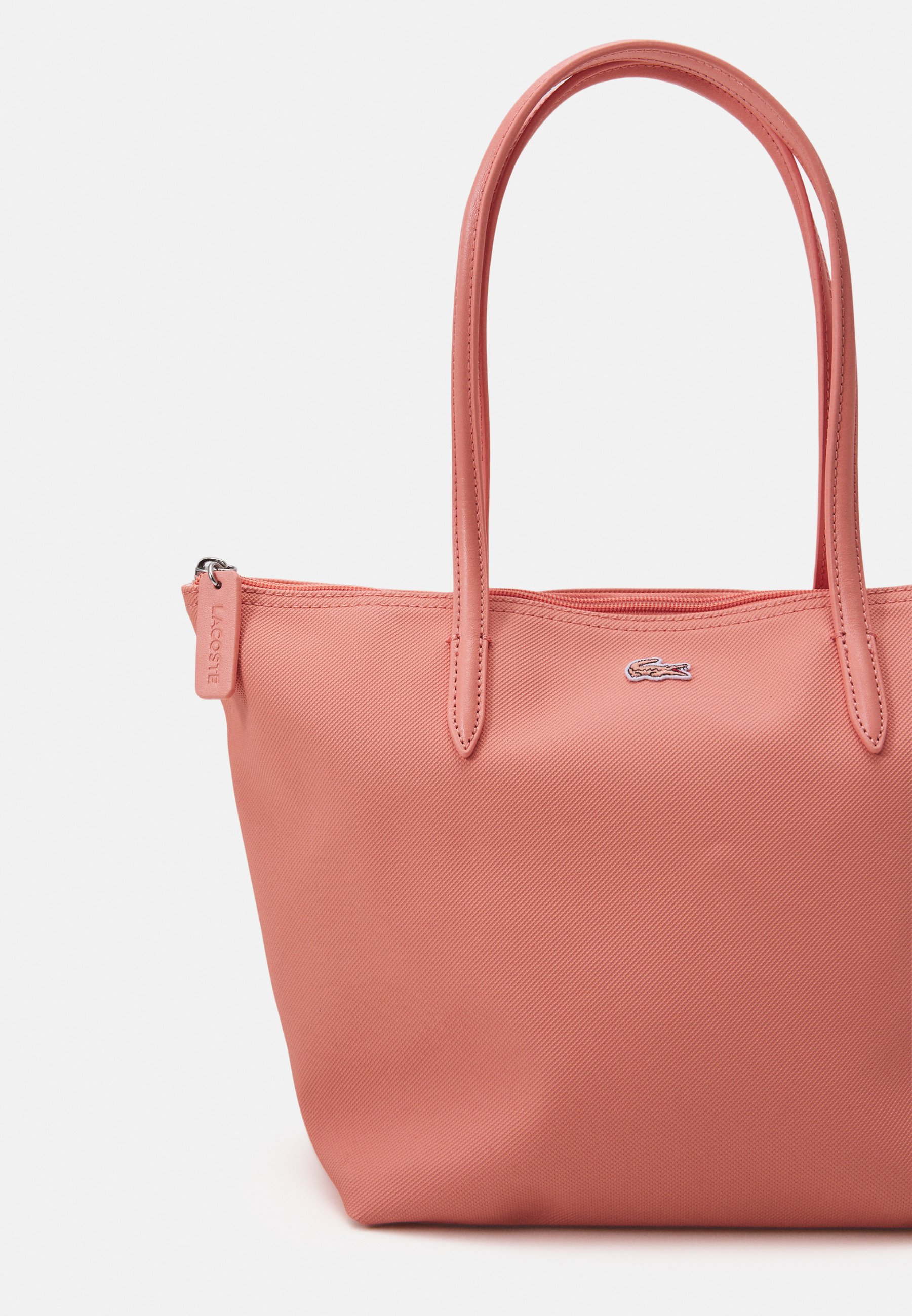 sac rose lacoste