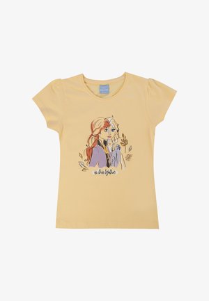 Żółta bawełniana koszulka z nadrukiem graficznym przedstawiającym dwoje postaci z długimi włosami i akcentami roślinnymi; poniżej napis "jesteśmy w tym razem."