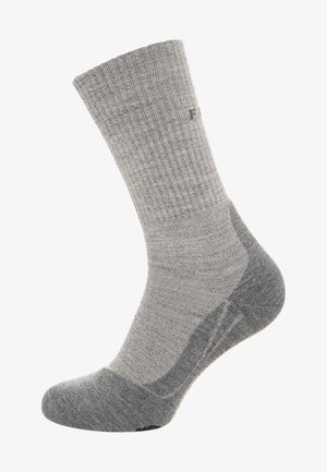 Calcetín gris de mezcla de lana con un diseño acanalado, talón y puntera reforzados, con un acabado suave y un sutil branding.