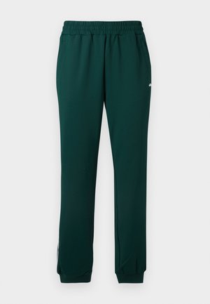 Pantaloni della tuta verde scuro con vita elasticizzata, tasche laterali e polsini alla caviglia. Realizzati in un materiale morbido e elastico.