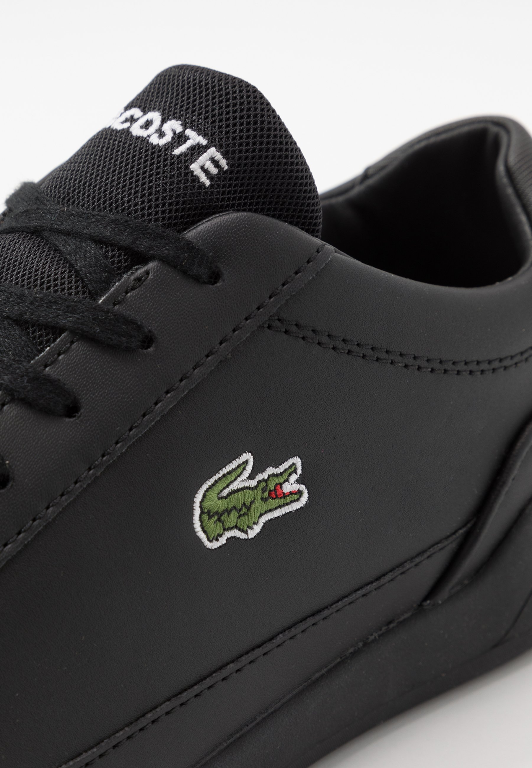 black lacoste trainers