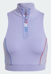 Lila crop top med hög krage, frontdragkedja och kontrasterande blå och röda sömmar längs sidorna. Tillverkad av slät tyg.