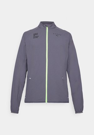 Gray athletic jacket featuring a high collar, neon green zipper, and printed logos. Includes side pockets and elasticized cuffs.