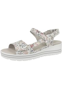 Vita sandaler med blommönster, öppen tå, justerbara remmar, texturerad innersula och en tjock, vadderad sula med subtila grå detaljer.