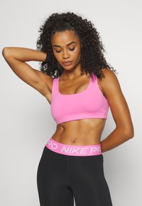 Nike Performance Tamprės - black/playful pink/white
