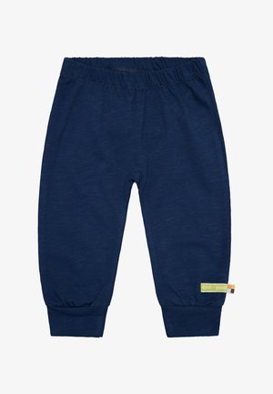 Marineblauwe katoenen broek met een brede elastische tailleband, taps toelopende boorden en een klein, meerkleurig logolabel aan de zijkant. Soepele textuur.