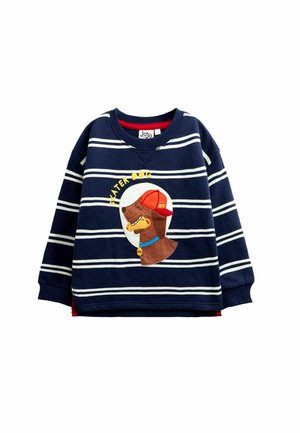 Marineblauw gestreept shirt met lange mouwen met een cartoonhond die een rode pet draagt en een skateboard vasthoudt, tekst "Skater Dog" boven het ontwerp.